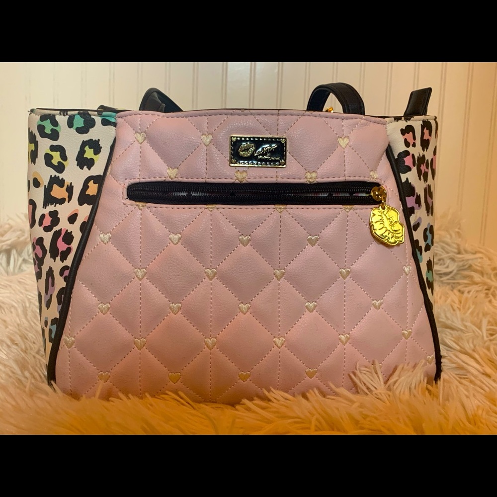 Betsy Johnson brand purse with pastel leopard accents.